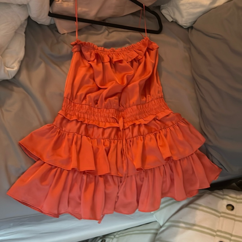 romper type dress, its a coral/ orange, very cute to eat out!
